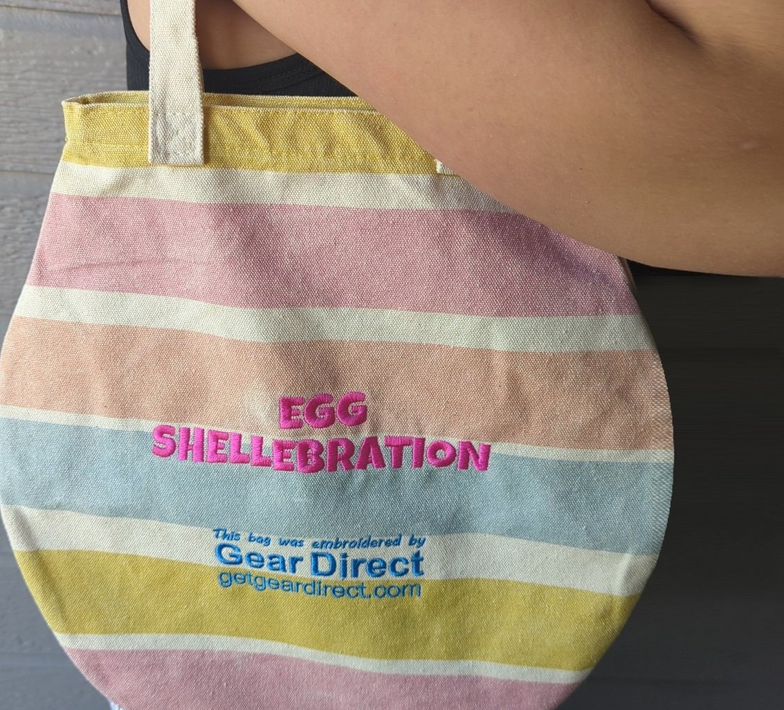 raffle gift giveaway prize: an embroidered egg shaped bag